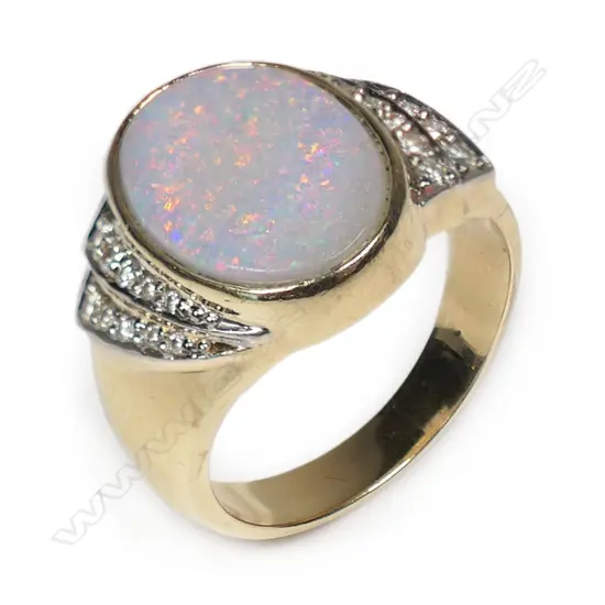 A gent's 10ct gold opal and diamond ring,