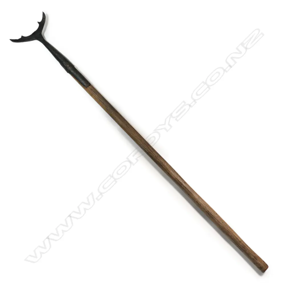 An old iron headed long wooden handled whale flensing tool, Image 1++