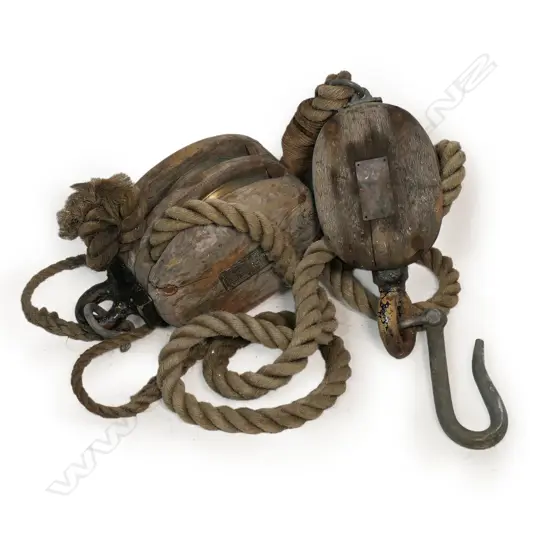 Two old maritime pulley blocks with rope (block and tackle),