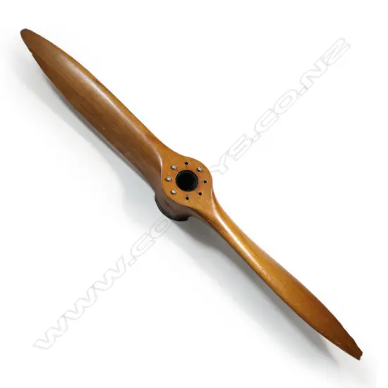 A 1940 laminated mahogany airplane propeller,