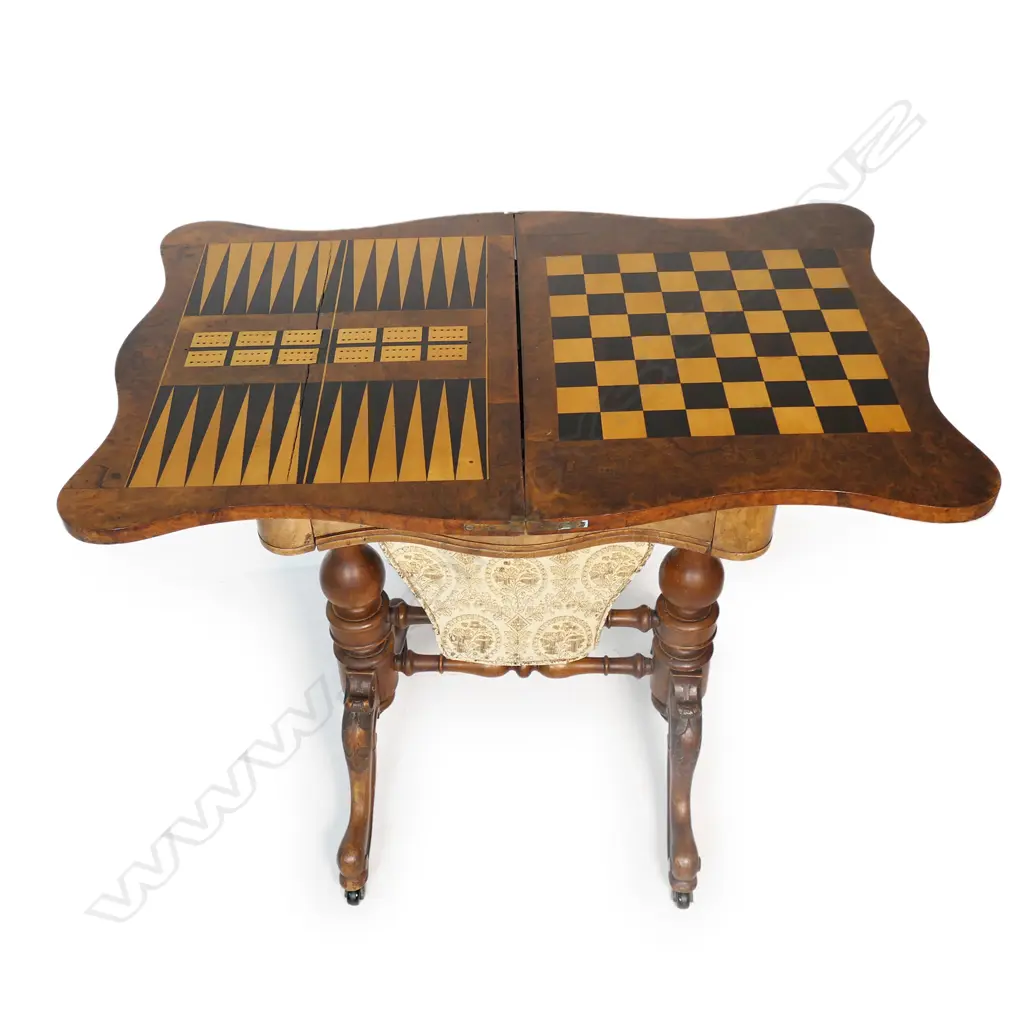 A Victorian burr walnut games and sewing table, Image 1++