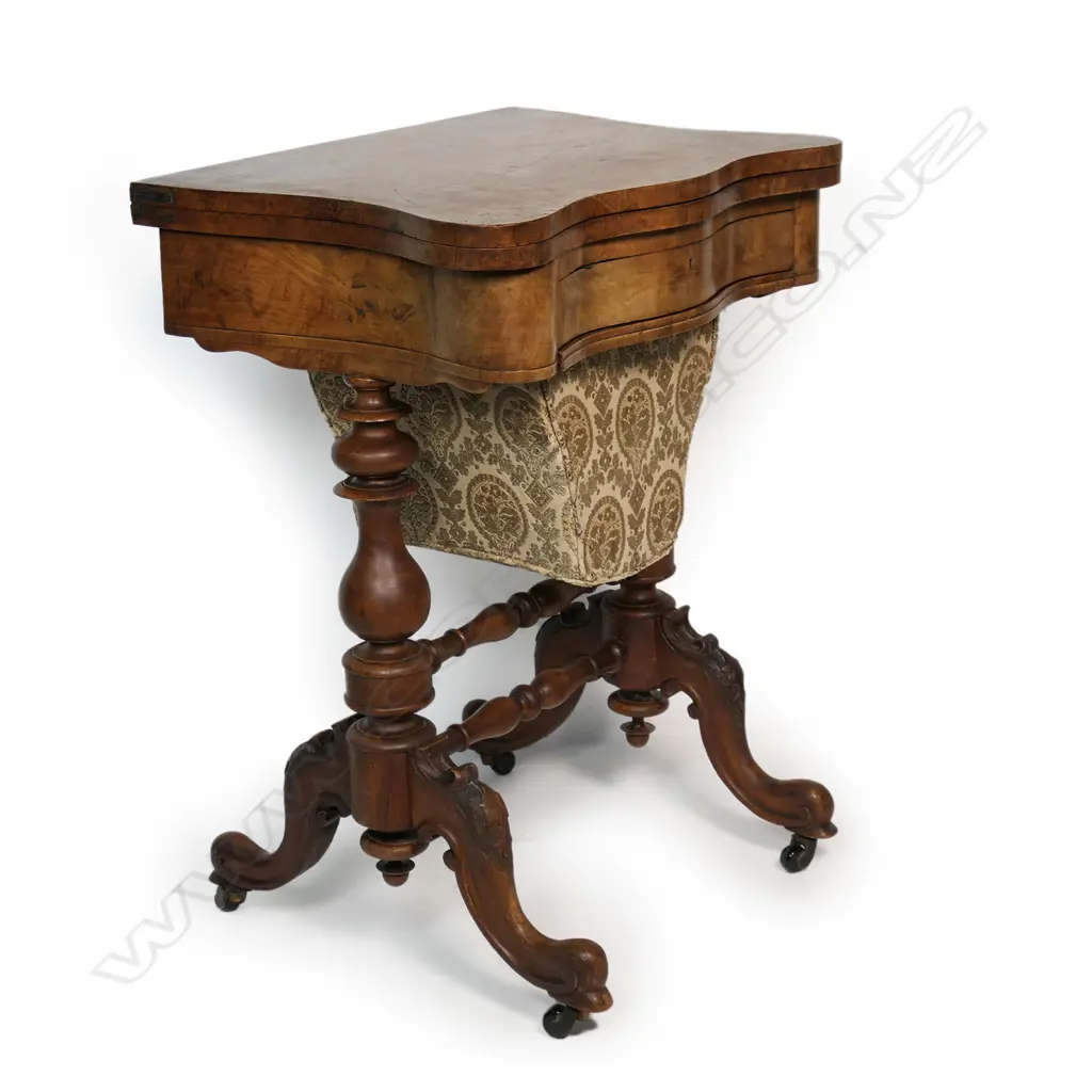 A Victorian burr walnut games and sewing table, Image 1++