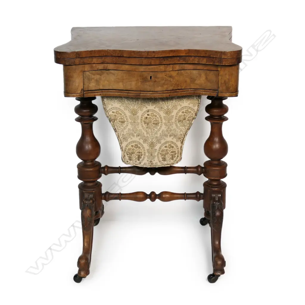 A Victorian burr walnut games and sewing table, Image 1++
