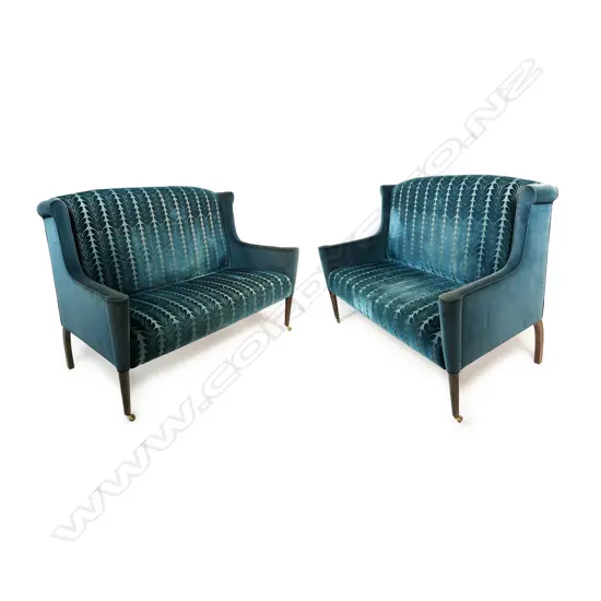 A pair of Designer Guild two seater sofas,