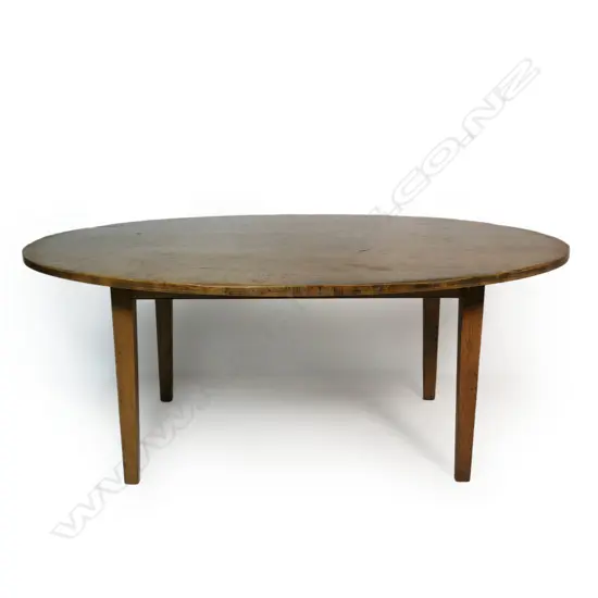 A 19thC country plank-top elm oval dining table,