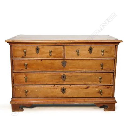A Continental walnut chest of drawers,