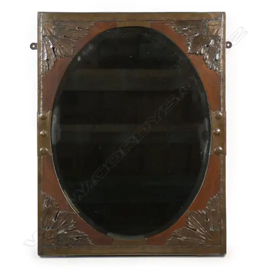 An early 1900s Arts and Crafts mirror,