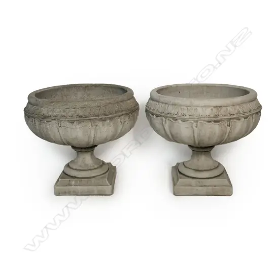 A pair of quality large cast concrete 'Blenheim' pedestal urns,