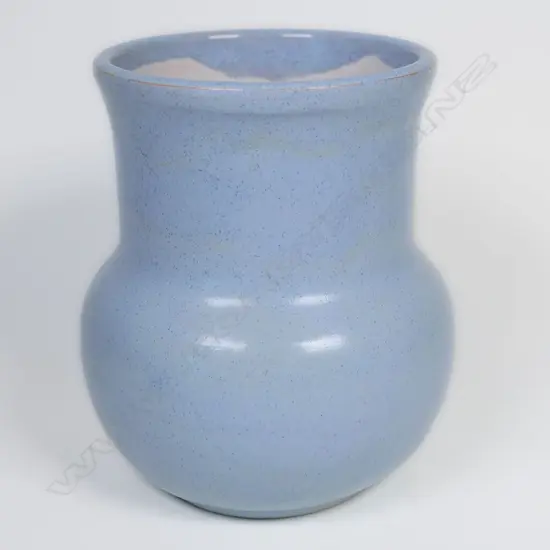 Olive Jones (1893 –1982) pale blue glaze baluster vase. Incised signature. H.130mm.