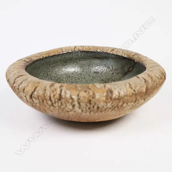 Len Castle small crater bowl with sea green interior. Dia 140mm.