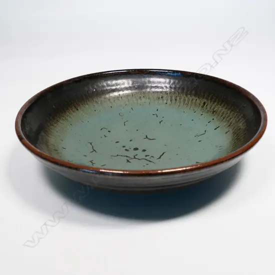 Len Castle aqua-green glazed circular dish. Dia.285mm.