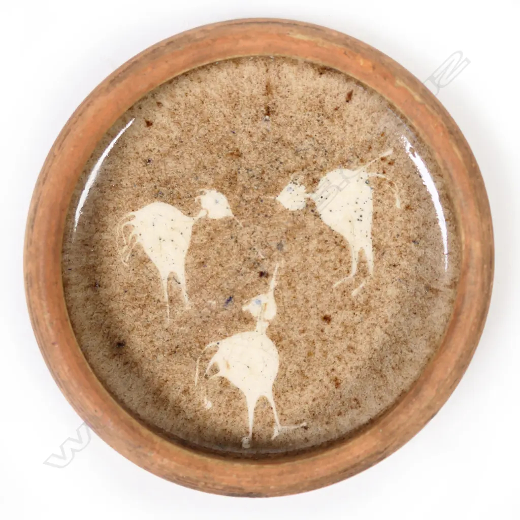 A good small “pin dish” by Len Castle with a speckled fawn glaze inside with 3 stylised kiwis in white Image 1++