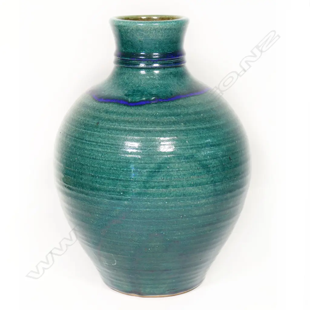 Graeme Storm spherical stoneware vase. Blue green glaze. H.330mm. Image 1++