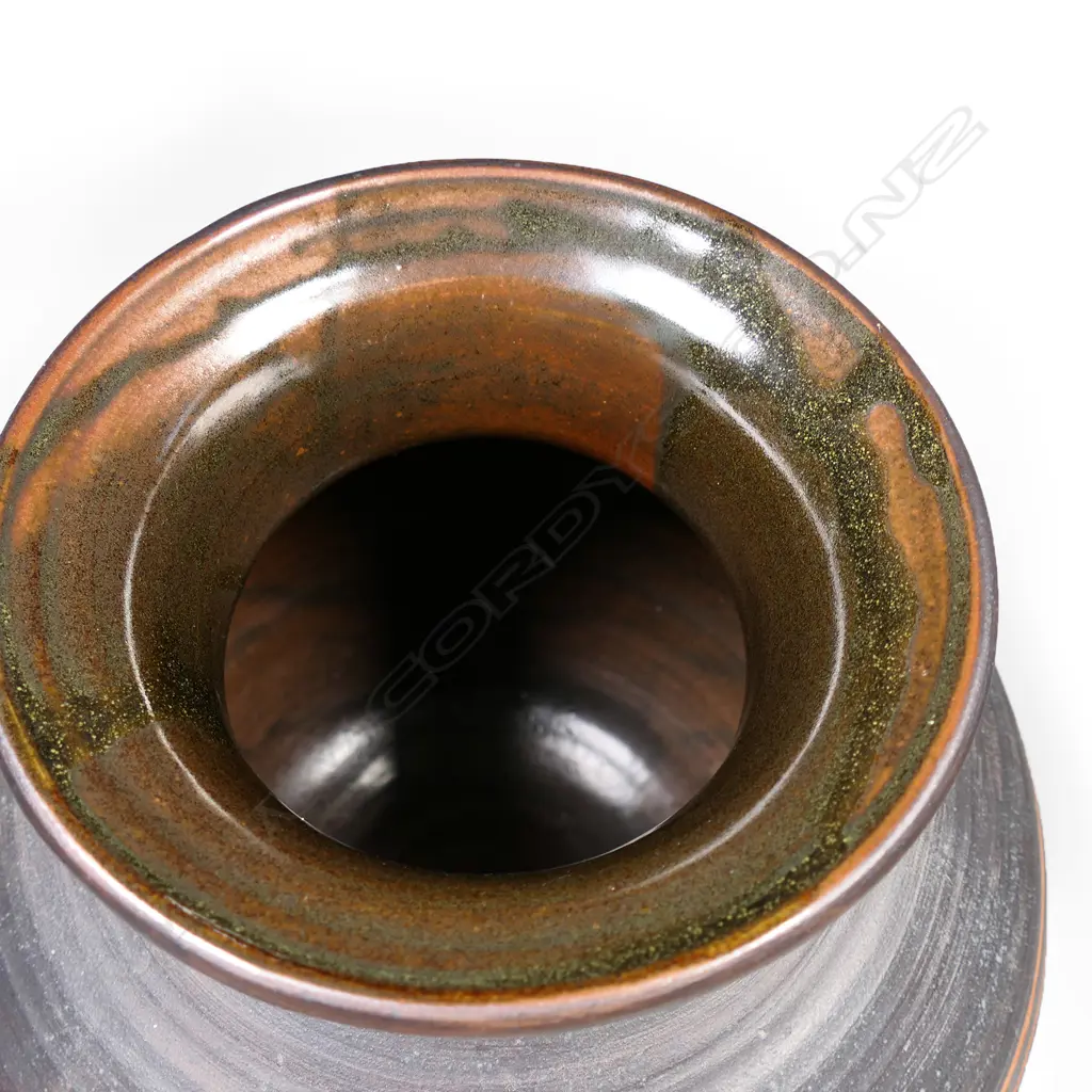 Graeme Storm large stoneware spherical vase. Matt brown with incised floral decoration. H.340mm. Image 1++