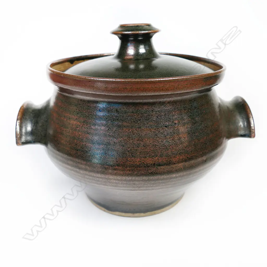 A Richard Cadness lidded casserole pot with two semi-circular handles to the body. Stamped to base. H.200mm Image 1++