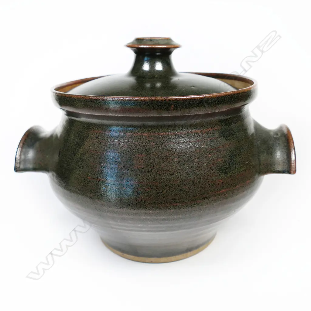 A Richard Cadness lidded casserole pot with two semi-circular handles to the body. Stamped to base. H.200mm Image 1++
