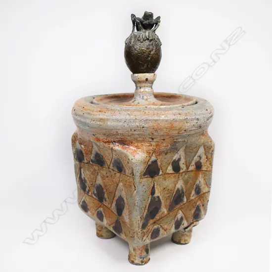 Ted Kindleysides square sided jar on 4 column feet