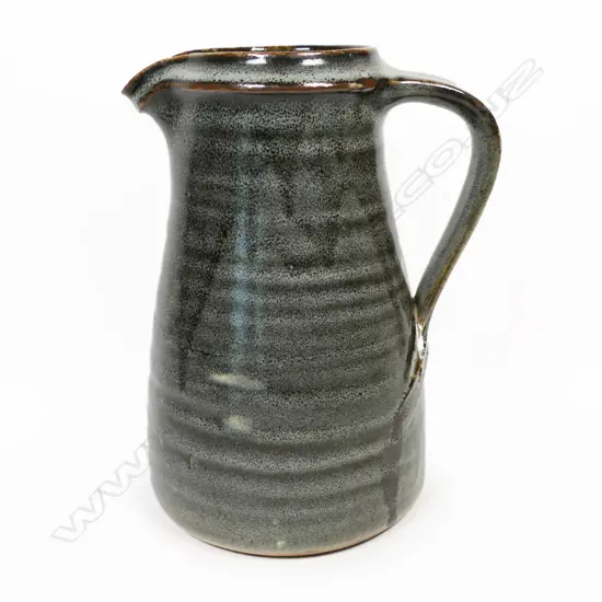 Bernard Leach standard ware  (St Ives) UK (1887-1979) large Grey/green glazed stoneware jug. H. 220mm.