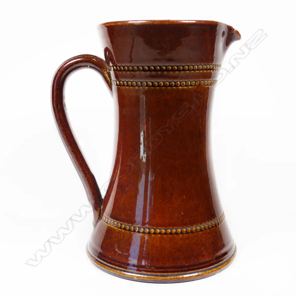 A Christchurch Brick Co. brown glazed  jug Image 1++