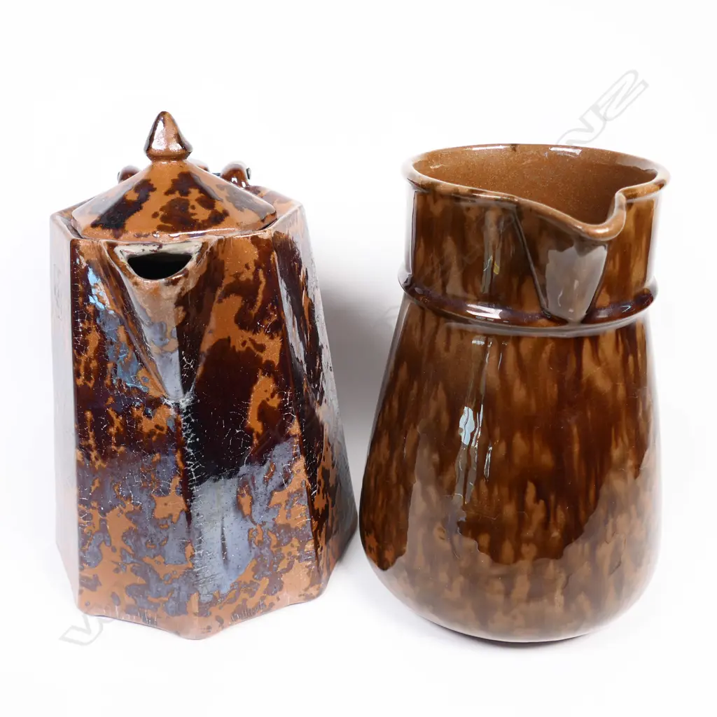 Two NZ Potteries mottled brown decorated jugs Image 1++