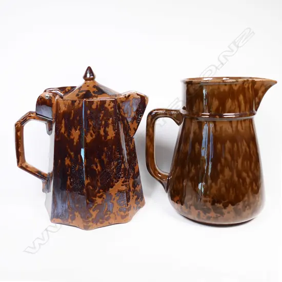 Two NZ Potteries mottled brown decorated jugs
