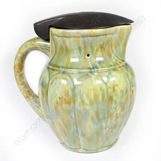A Temuka Ware mottled glaze pottery electric jug