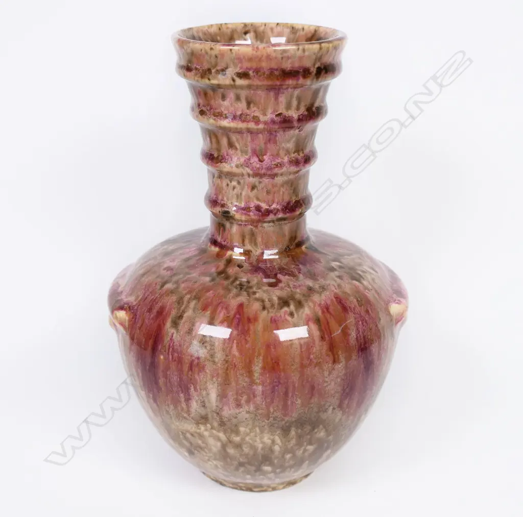 Early Crown Lynn / Ambrico vase in mottled red/brown glaze with ribbed neck H.185mm. Image 1++