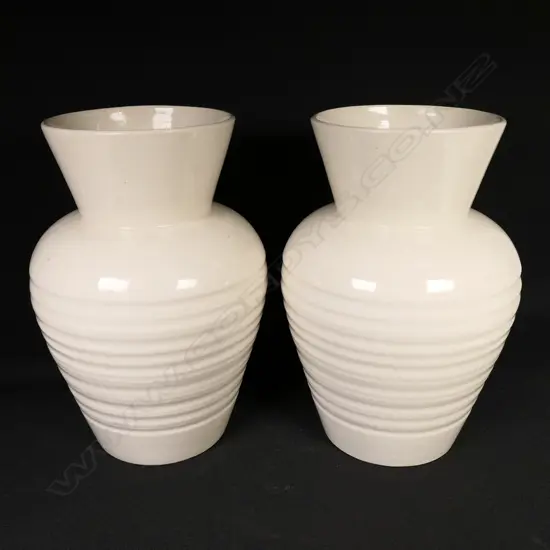 2 large Crown Lynn flared and ring turned vases. Both moulded with glossy glaze and '2070' to base. H.250mm