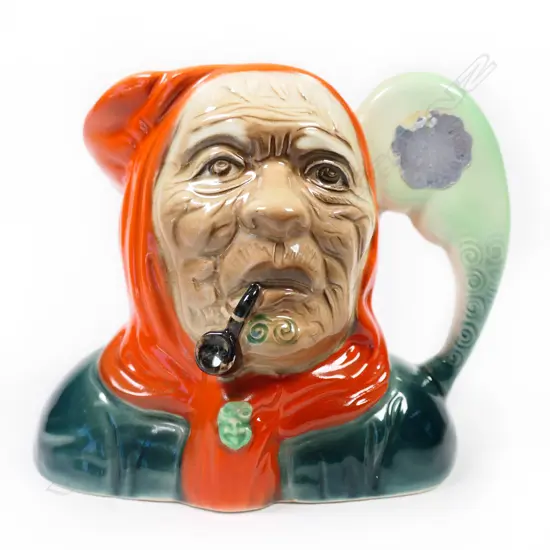 Titian Studio Wahine Jug w remains original silver label affixed to patu handle. H.125mm
