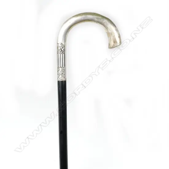 An early 1900s silver handled hiking cane