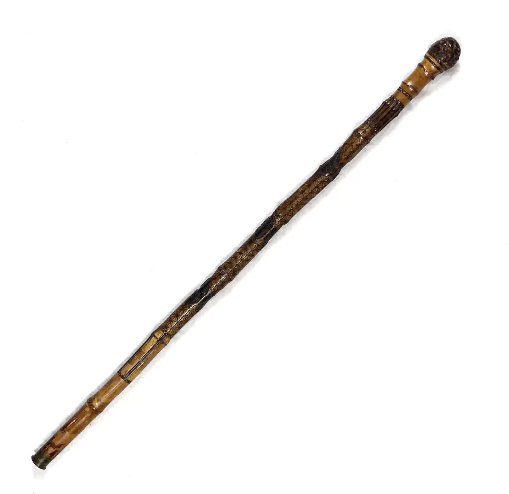 A carved Japanese bamboo walking stick Image 1++