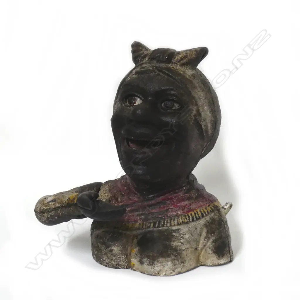 An American colonial 'Dinah' mechanical cast iron money box Image 1++