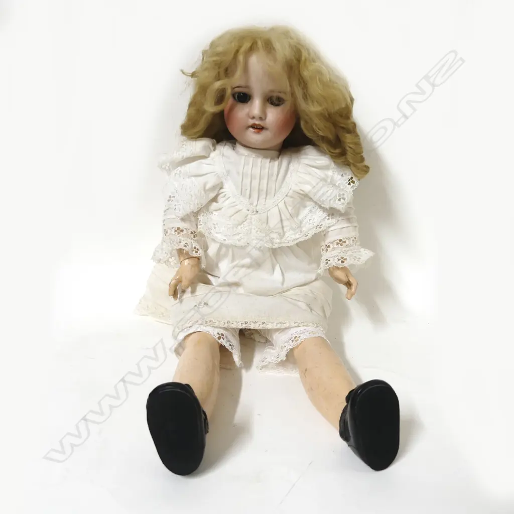 A good French S.F.B.J. bisque porcelain doll Image 1++