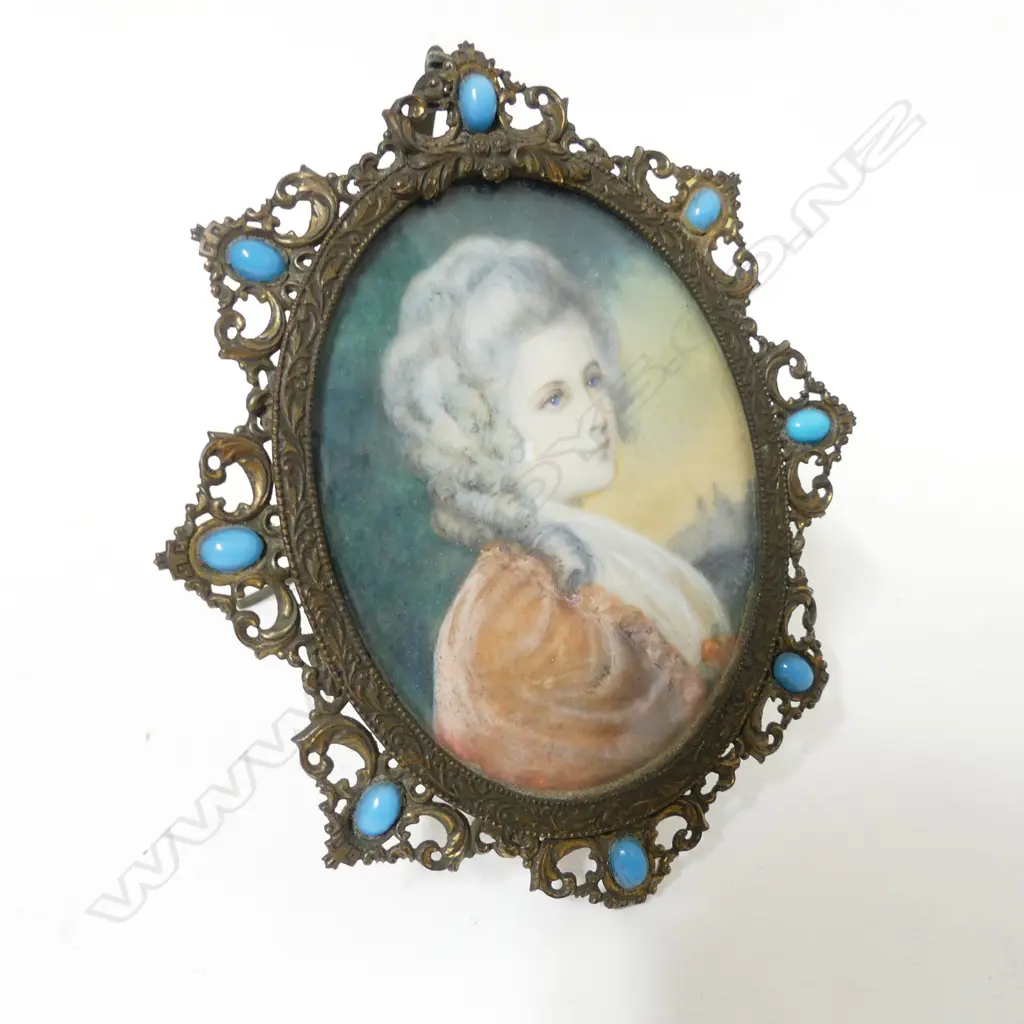 A hand painted portrait miniature on ivory Image 1++