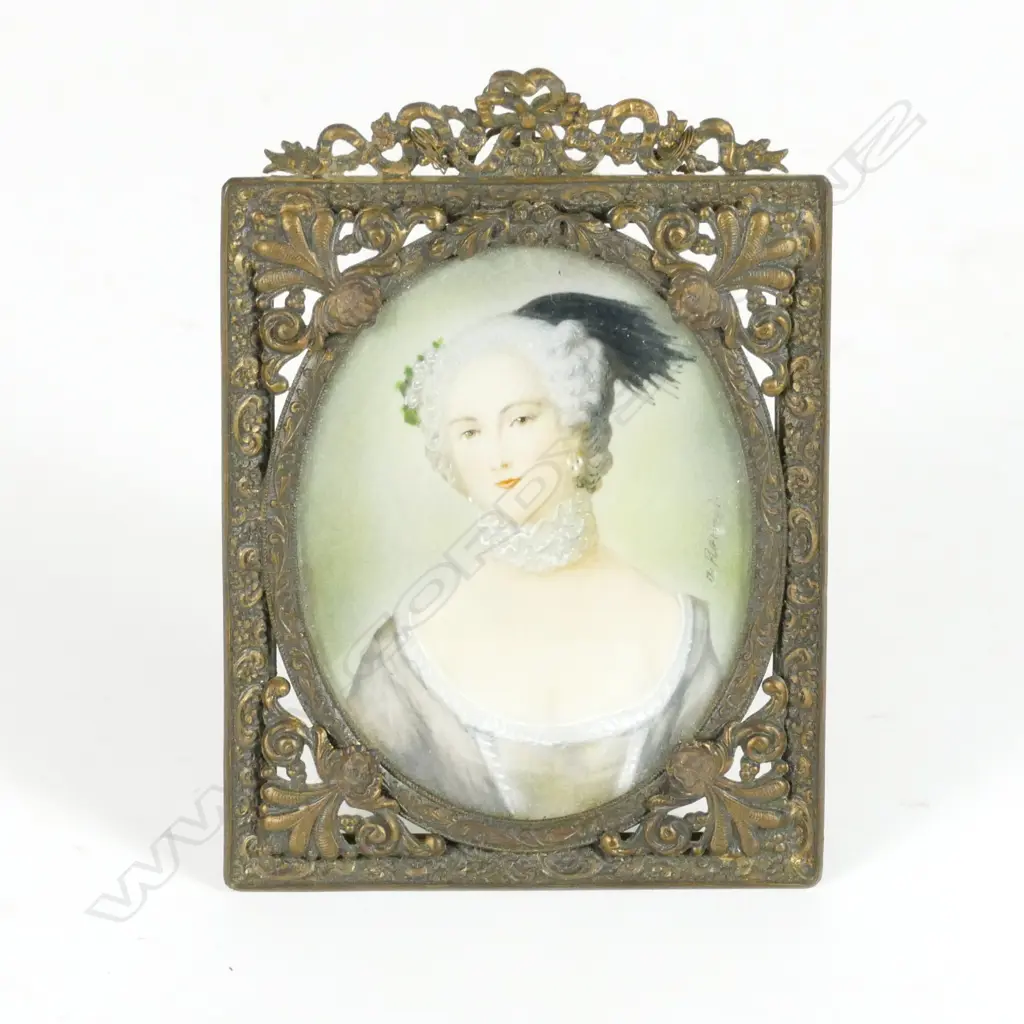 A hand painted portrait miniature on ivory Image 1++