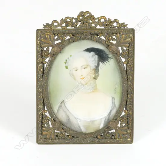 A hand painted portrait miniature on ivory