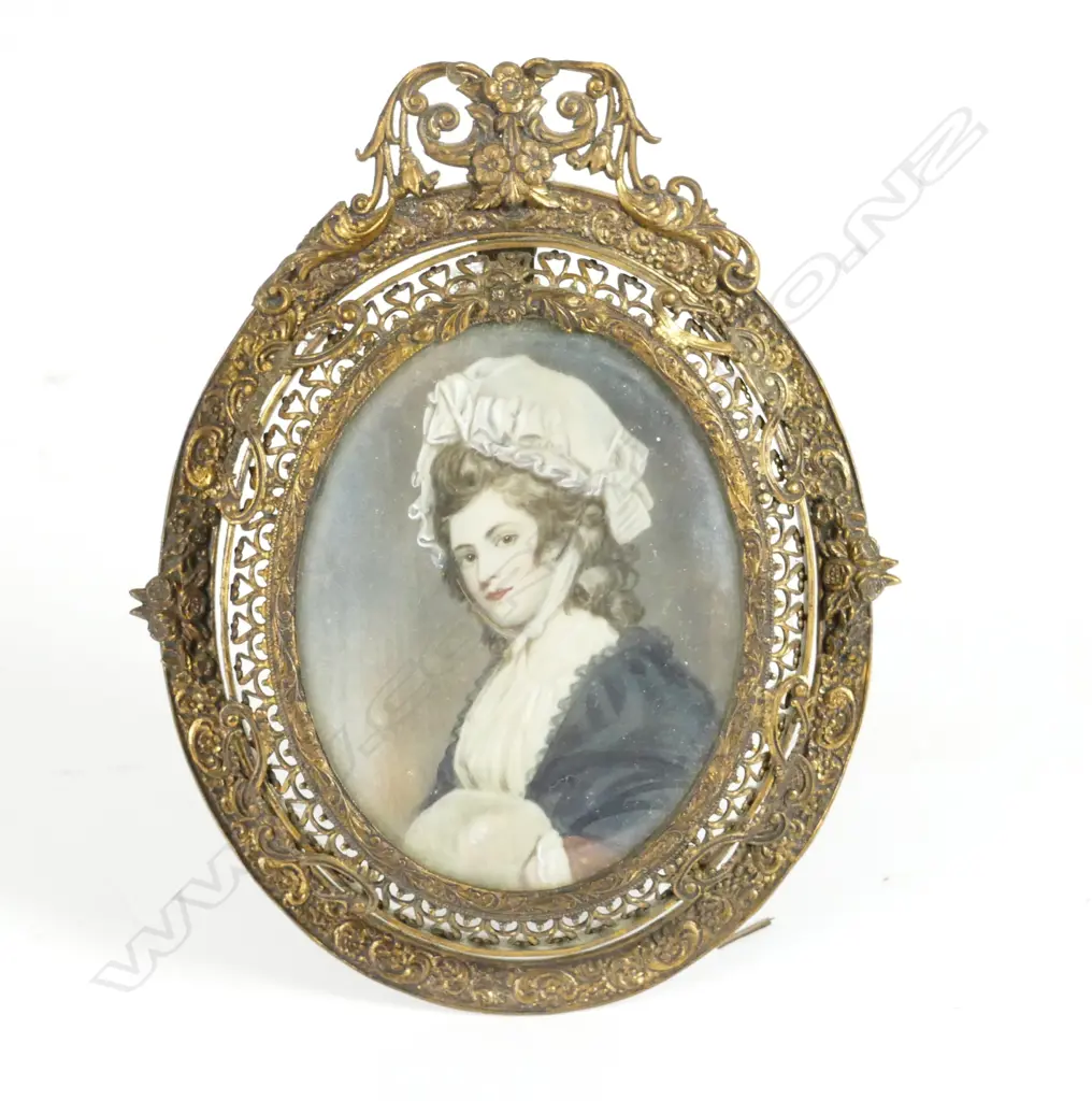 A hand painted portrait miniature on ivory Image 1++