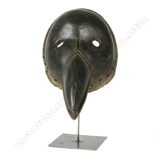A carved Congolese tribal bird mask