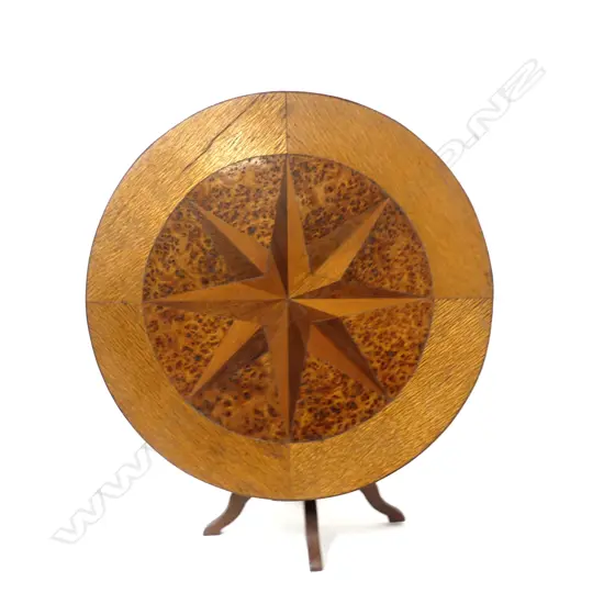 A N.Z. timbers apprentice tilt-top table