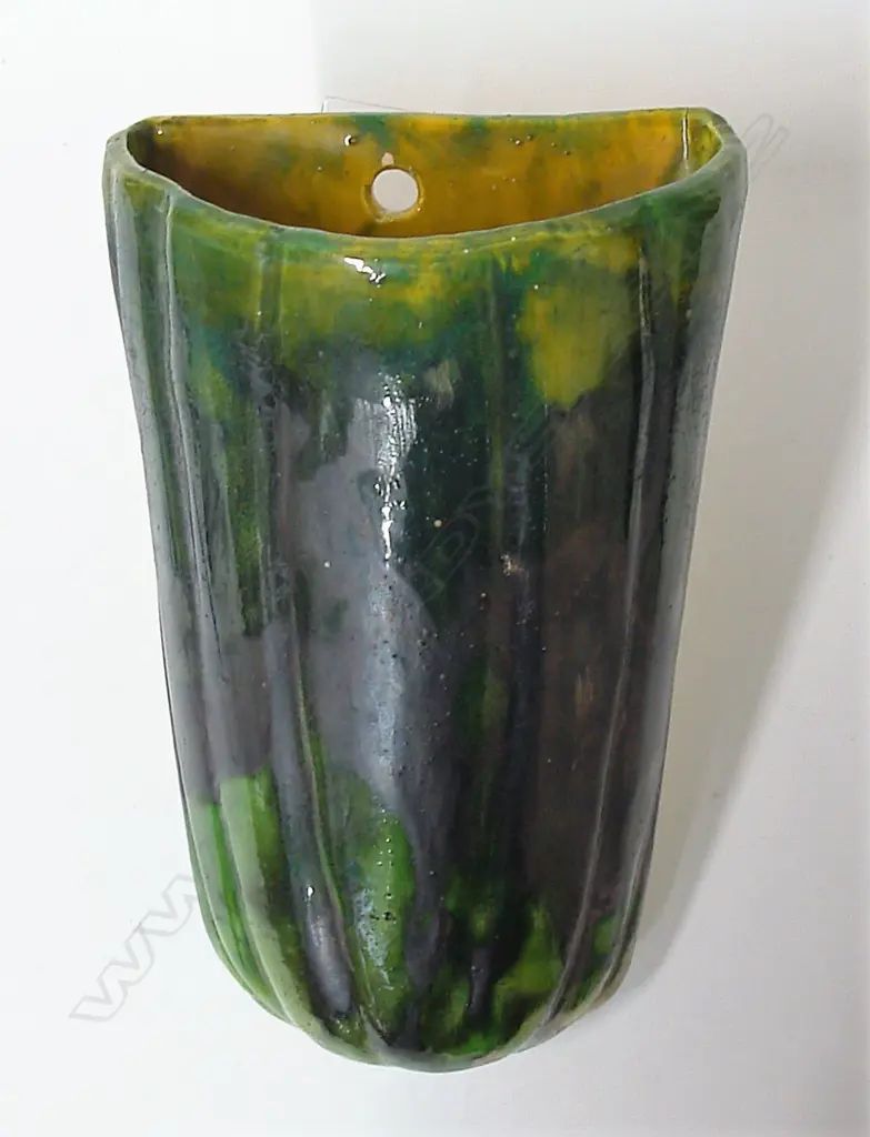 A large Briar Gardner wall pocket vase glazed in emerald green Image 1++
