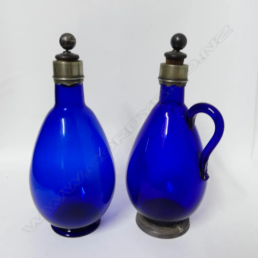 A Bristol blue glass flask and bottle Image 1++