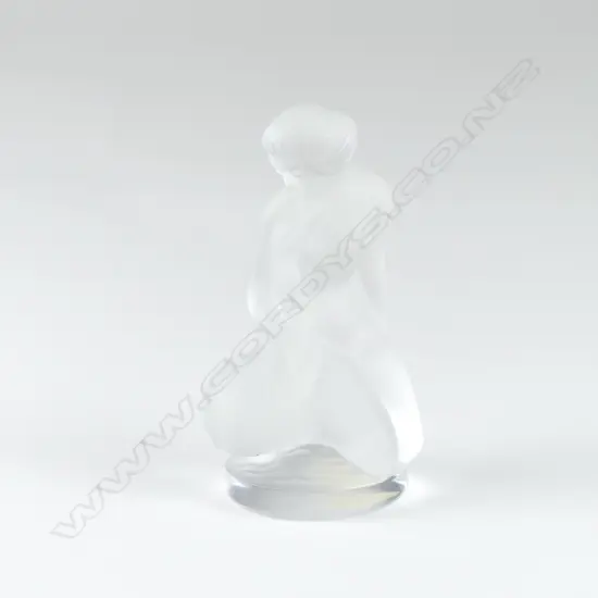 A Lalique frosted glass paperweight
