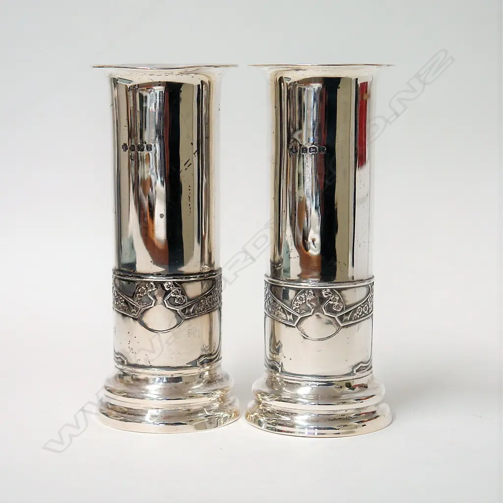 A pair of early 20thC Arts & Crafts silver vases Image 1++