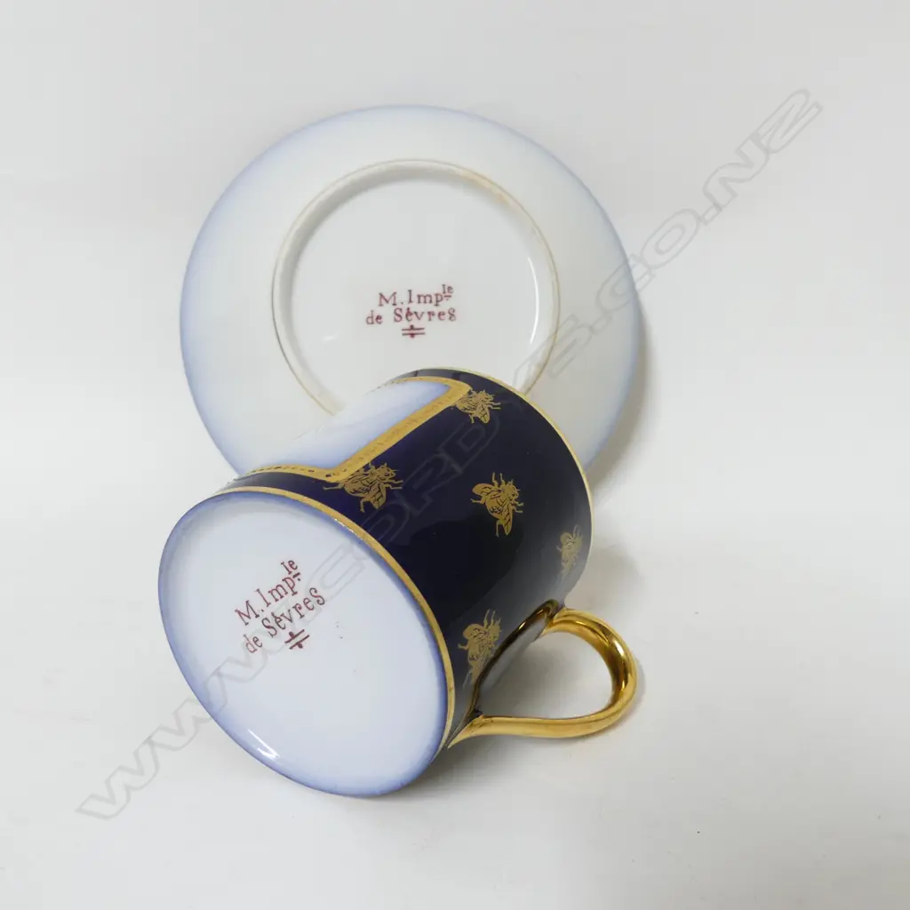 A pair of Sèvres coffee cans and saucers Image 1++