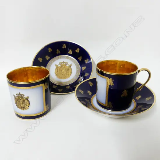A pair of Sèvres coffee cans and saucers