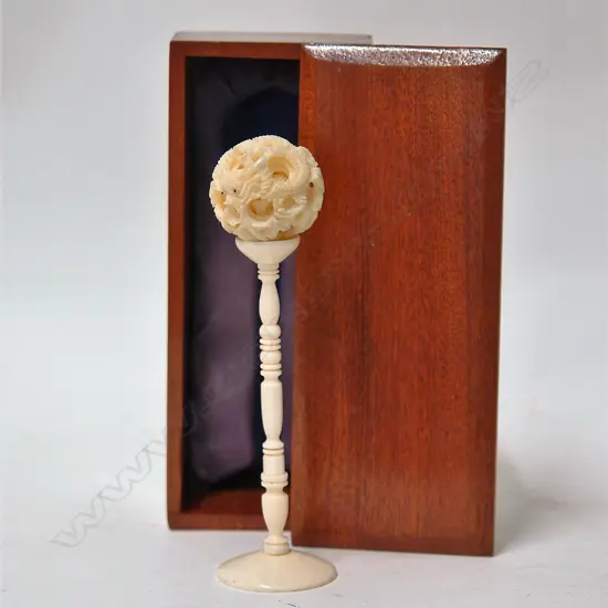 A vintage Chinese carved ivory puzzle ball on stand