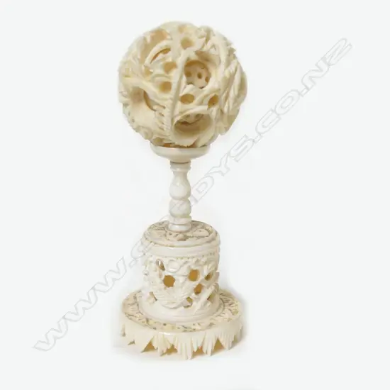 A small ivory carved puzzle ball