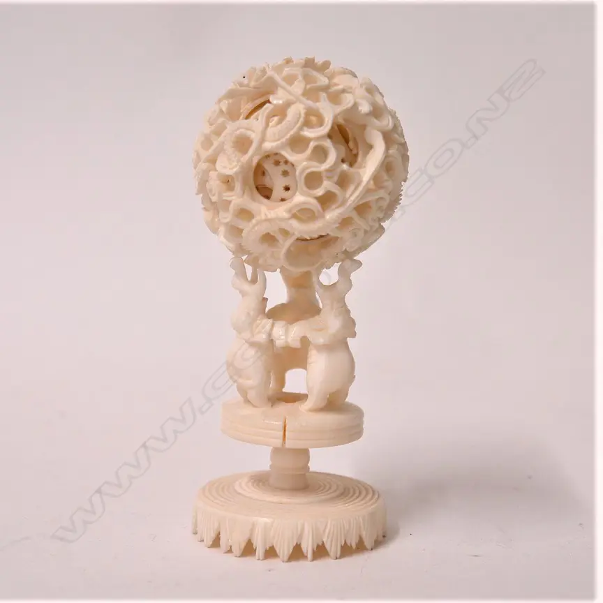 A Chinese vintage carved ivory puzzle ball on stand Image 1++