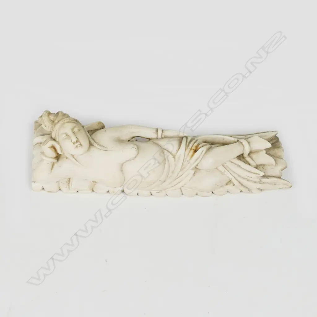 An old ivory Chinese doctor's model of a reclining woman Image 1++