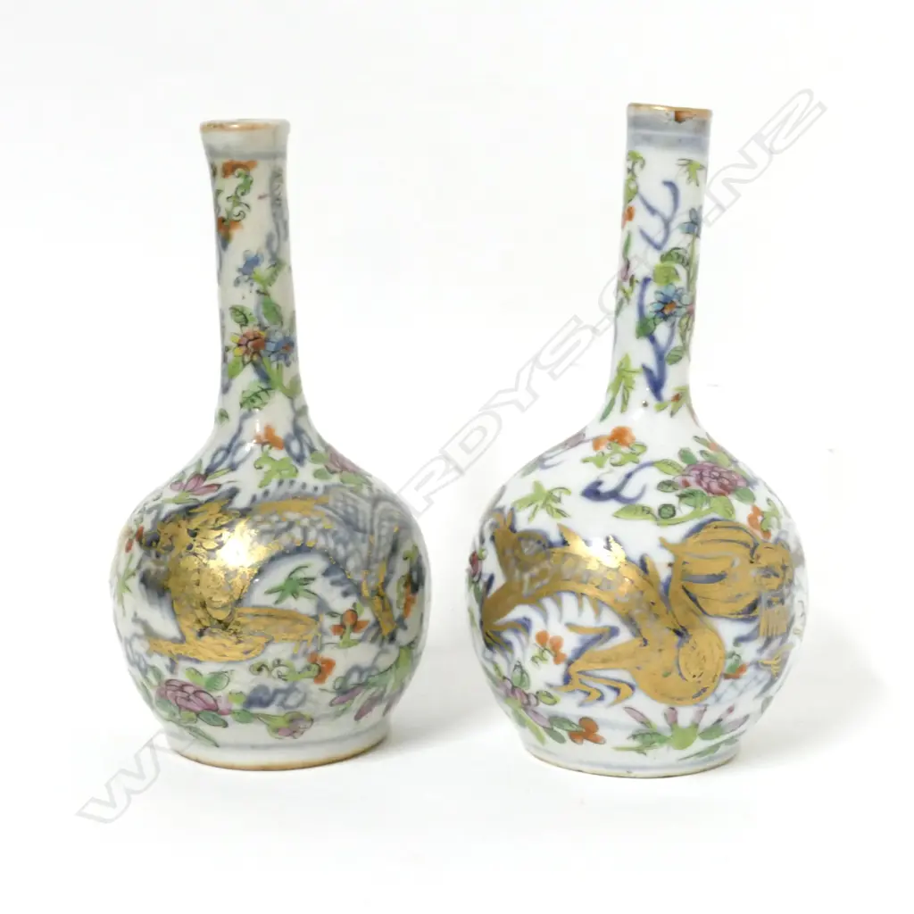A pair of famille rose bottle vases Image 1++